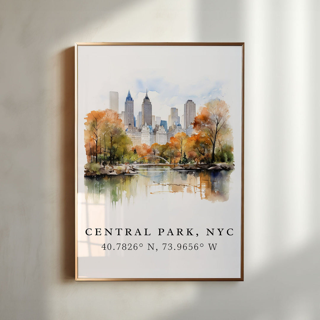 Central Park NYC watercolor wall art in a gold frame featuring a peaceful pond, autumn trees, and the Manhattan skyline in soft watercolor.