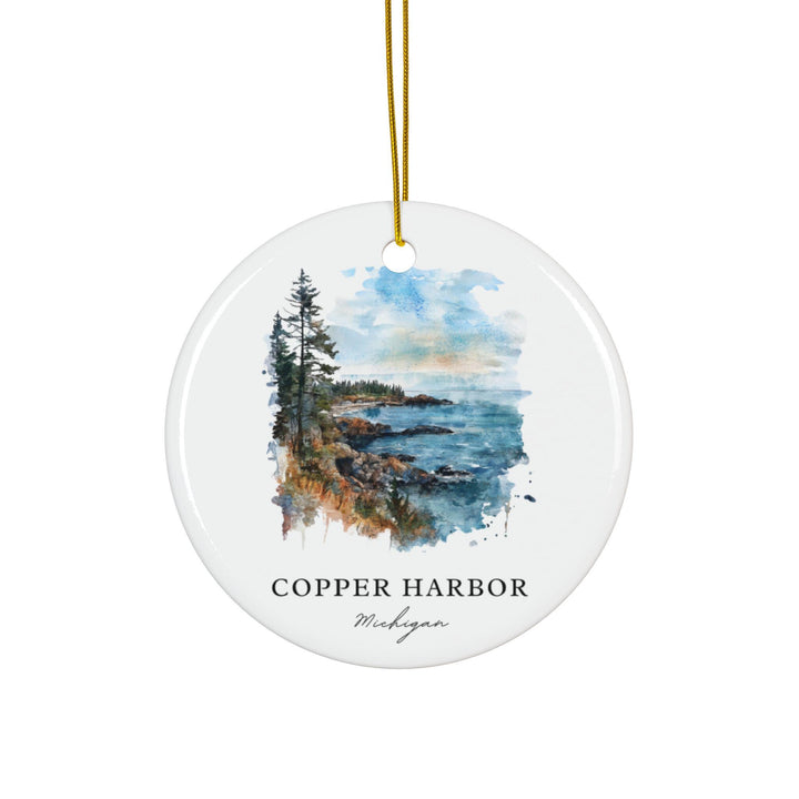 Copper Harbor Michigan white holiday ornament featuring a watercolor Lake Superior shoreline with rugged rocks, tall pines, and peaceful coastal views.