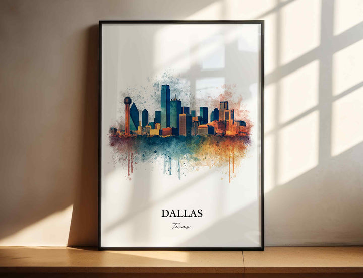 Dallas Texas watercolor wall art in a black frame featuring the iconic skyline, Reunion Tower, modern skyscrapers, and vibrant blue and amber watercolor accents.