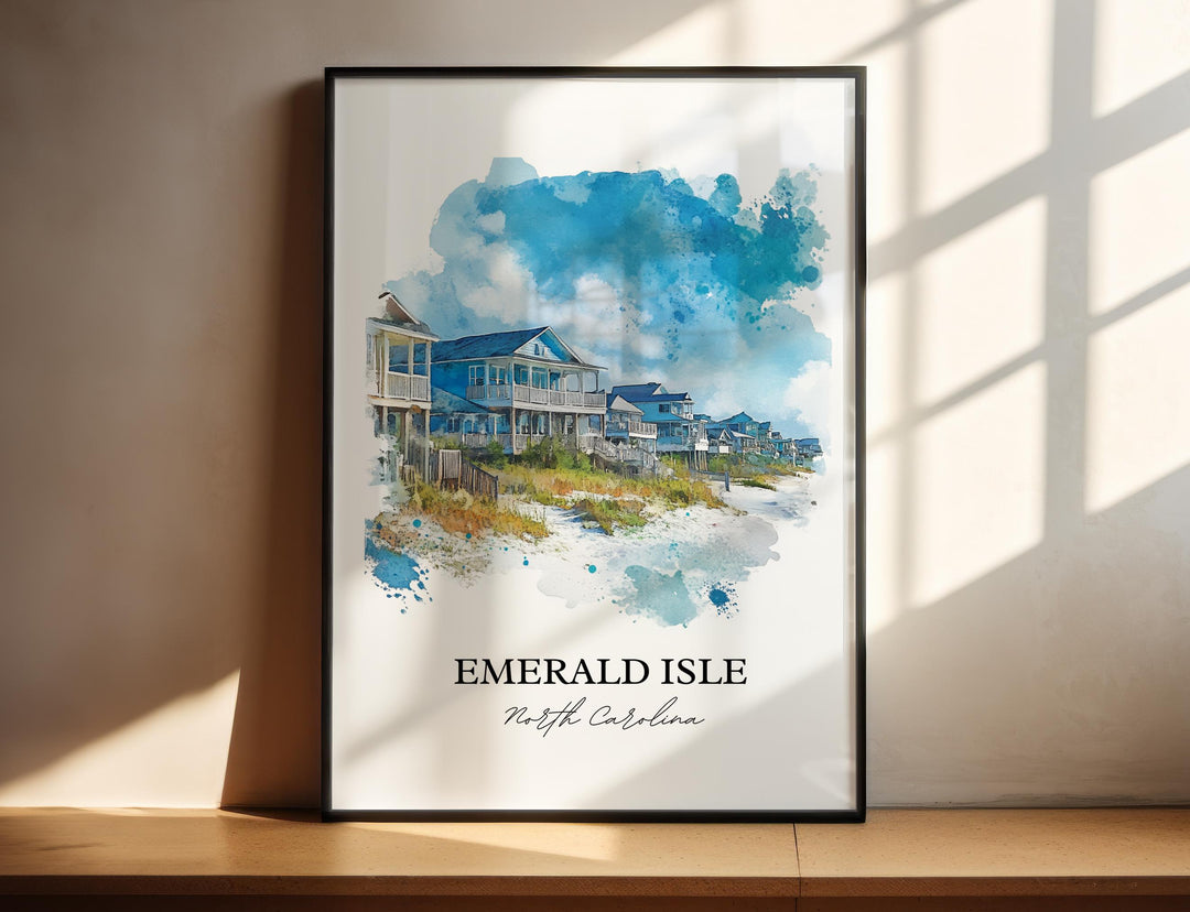 Emerald Isle North Carolina watercolor wall art in a black frame featuring charming beach cottages beside white sand and calming coastal blue skies.