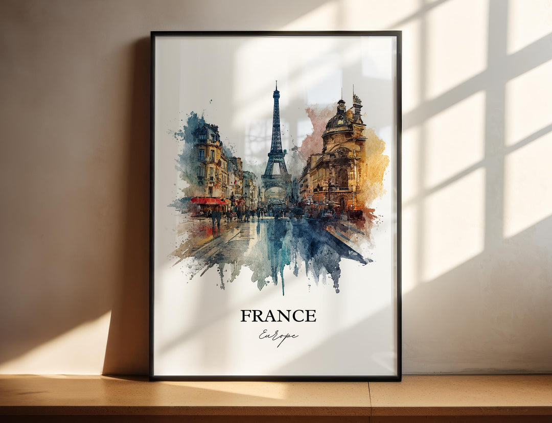 France watercolor wall art in a black frame featuring the Eiffel Tower, elegant Parisian architecture, lively city streets, and expressive blue and gold watercolor splashes.