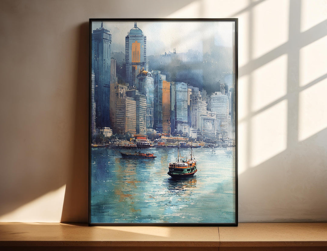 Hong Kong Victoria Harbour watercolor wall art in a black frame captures ferries, shimmering waters, and the iconic skyline.