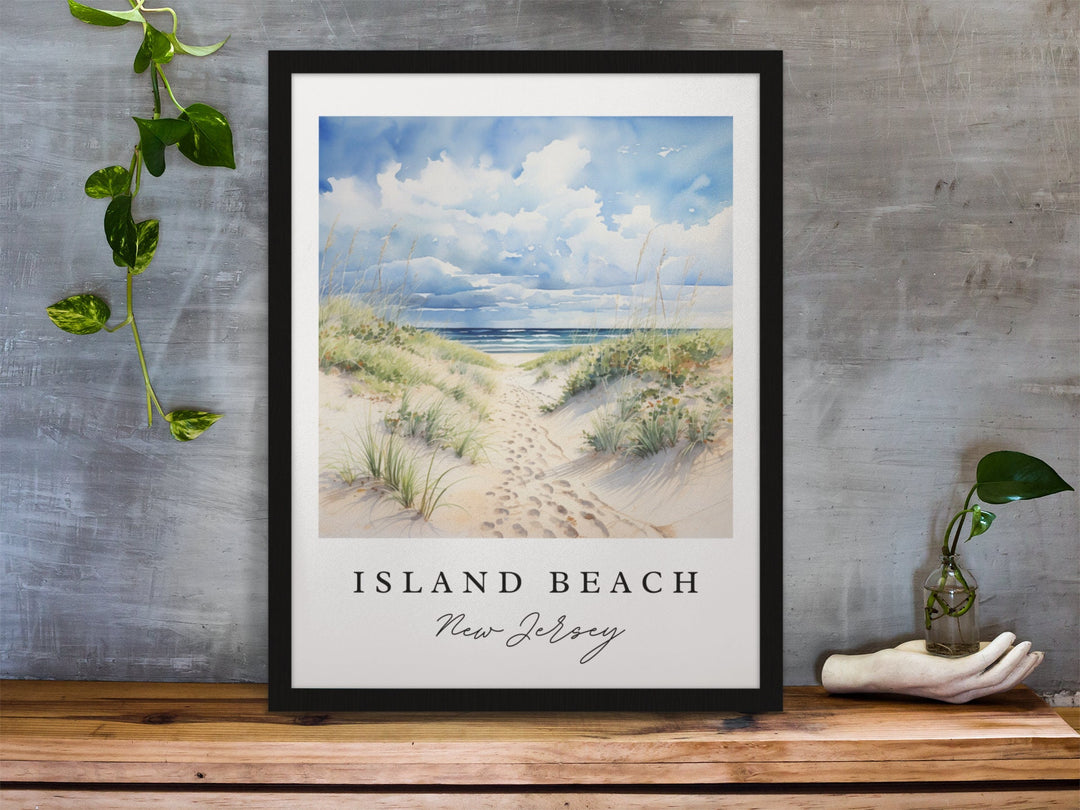 Island Beach New Jersey watercolor wall art in a black frame featuring sandy dunes, sea grass, soft blue skies, and peaceful ocean shoreline.