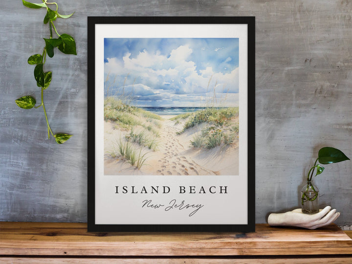 Island Beach New Jersey watercolor wall art in a black frame featuring sandy dunes, sea grass, soft blue skies, and peaceful ocean shoreline.