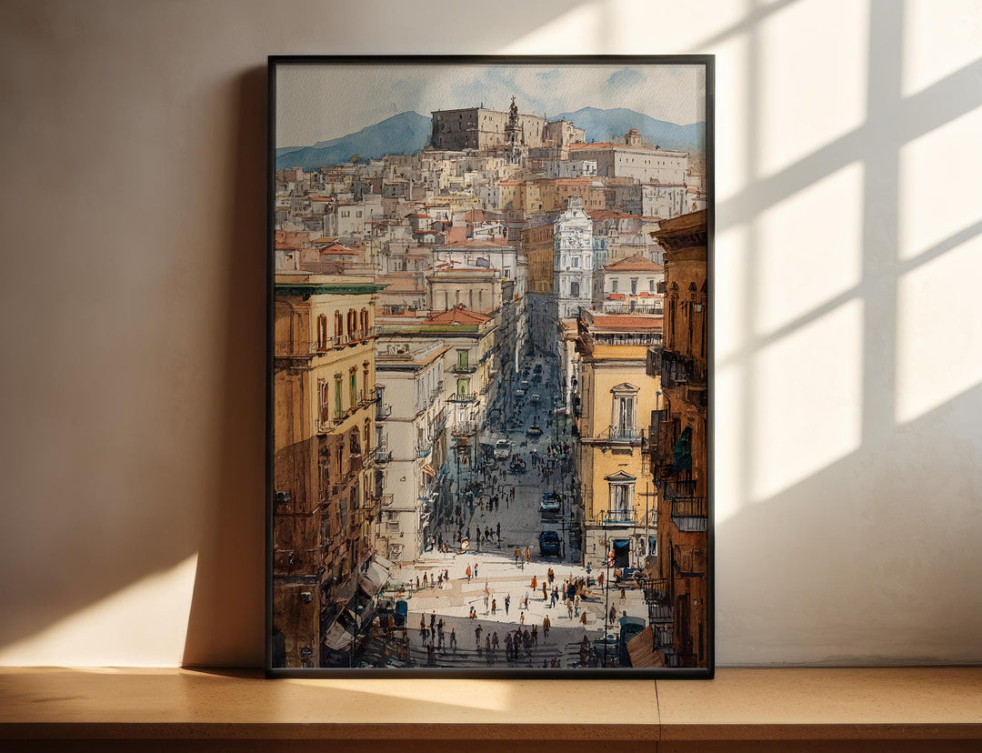 Watercolor Naples Spaccanapoli Street wall art in a black frame featuring the historic avenue, classic architecture, and the skyline of Naples, Italy.