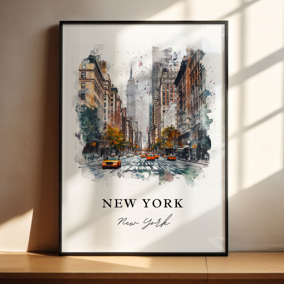 Black framed Empire State Building, New York watercolor wall art featuring a lively Manhattan street with yellow taxis and iconic city scenery.