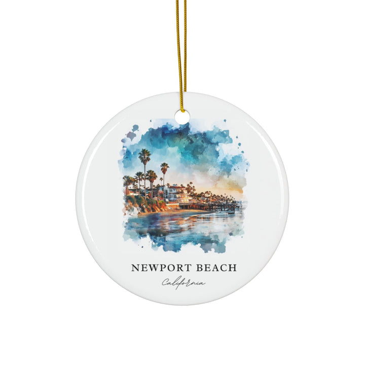 Newport Beach California holiday ornament with a white ceramic finish featuring a scenic coastline, swaying palm trees, tranquil ocean views, and a gold hanging cord.