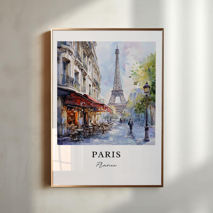 Paris France watercolor wall art in a gold frame featuring the Eiffel Tower, a charming café street, and elegant Parisian architecture.