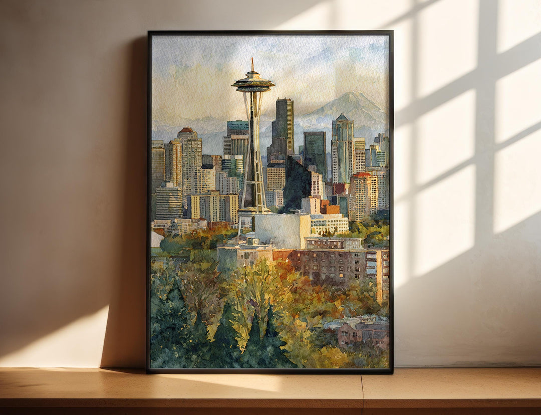 Watercolor Seattle wall art in a black frame featuring the Space Needle with Mount Rainier beyond the skyline, a Washington city print.