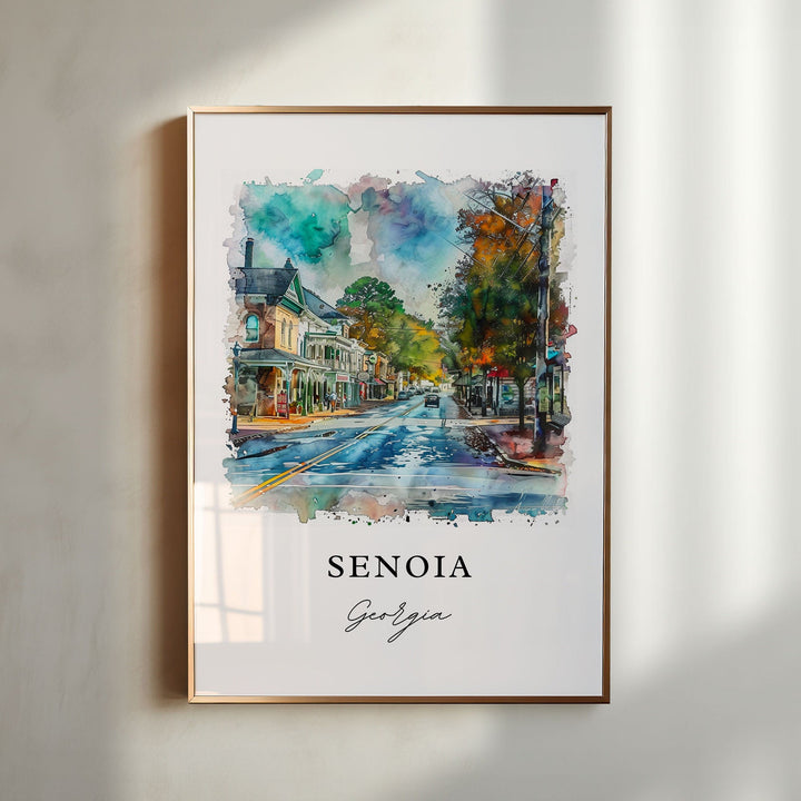 Senoia Georgia watercolor wall art in a gold frame featuring charming storefronts, colorful autumn trees, and a peaceful small-town streetscape.