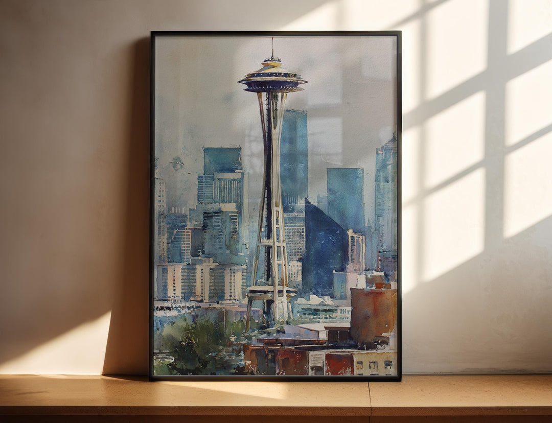 Watercolor Space Needle Seattle wall art in a black frame featuring the iconic tower rising above the downtown skyline, a striking Washington city print.