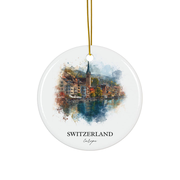 Switzerland Europe white holiday ornament featuring a watercolor lakeside village with historic architecture, church spire, and peaceful waterfront views.