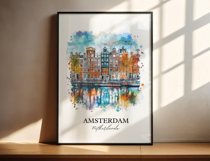 Watercolor travel art print of Amsterdam, Netherlands featuring traditional canal houses, autumn trees, and boats reflecting on the water, displayed in a black frame.