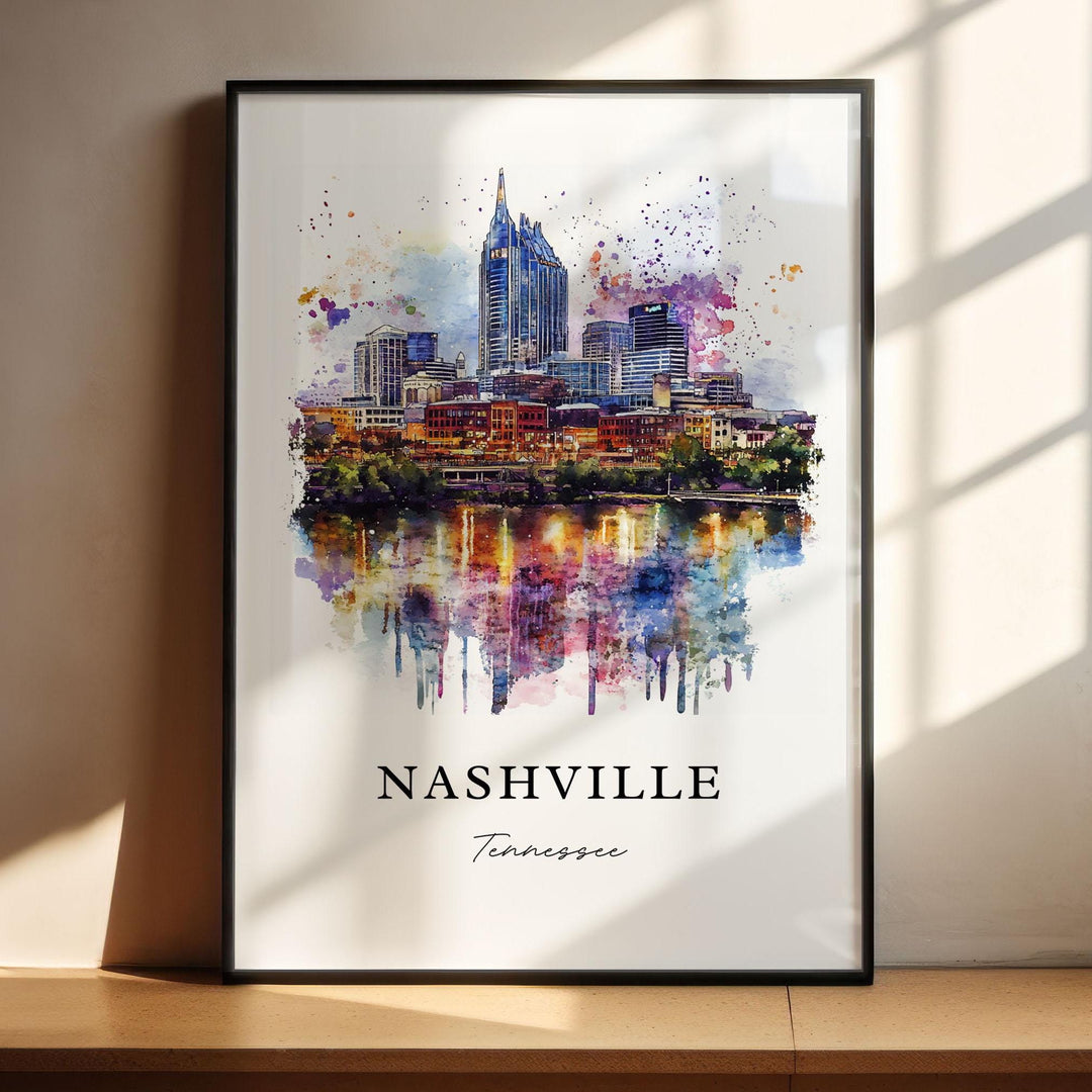 Vibrant watercolor travel art print of Nashville, Tennessee featuring the downtown city skyline with the iconic AT&T Batman Building reflecting on the Cumberland River, displayed in a black frame.