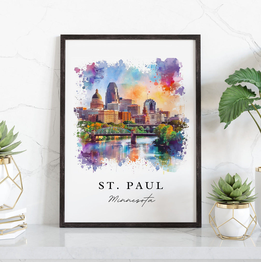 Vibrant watercolor travel art print of the St. Paul, Minnesota city skyline and river bridge with a colorful abstract splash design, displayed in a black wood frame.
